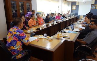 Stakeholders meeting up at a roundtable