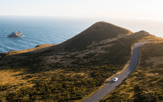 Picture of Sonoma, California, mountain with road and a car next to the sea